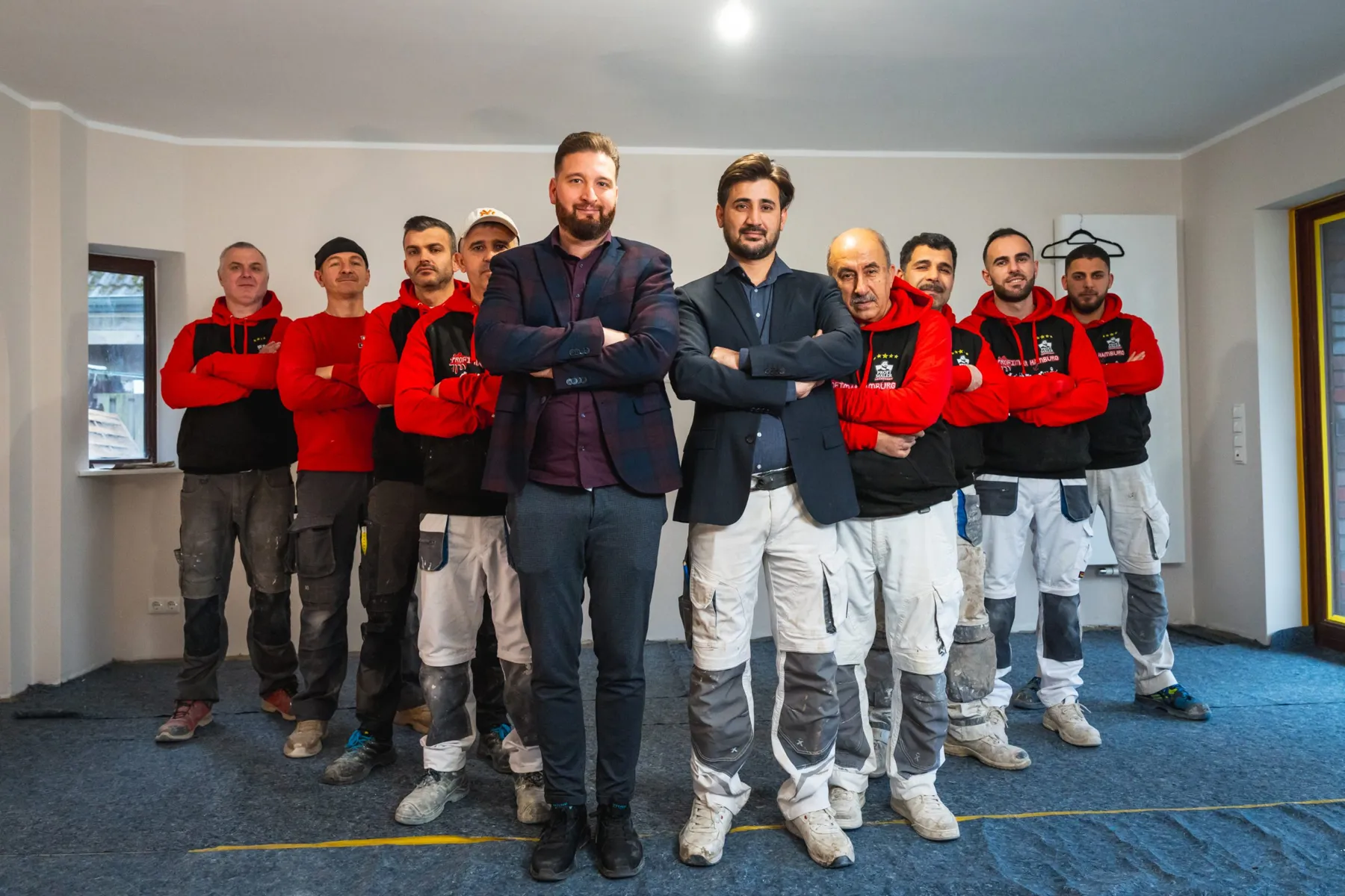 Das Team von Profi Innenausbau und Profimaler Hamburg auf einer Baustelle